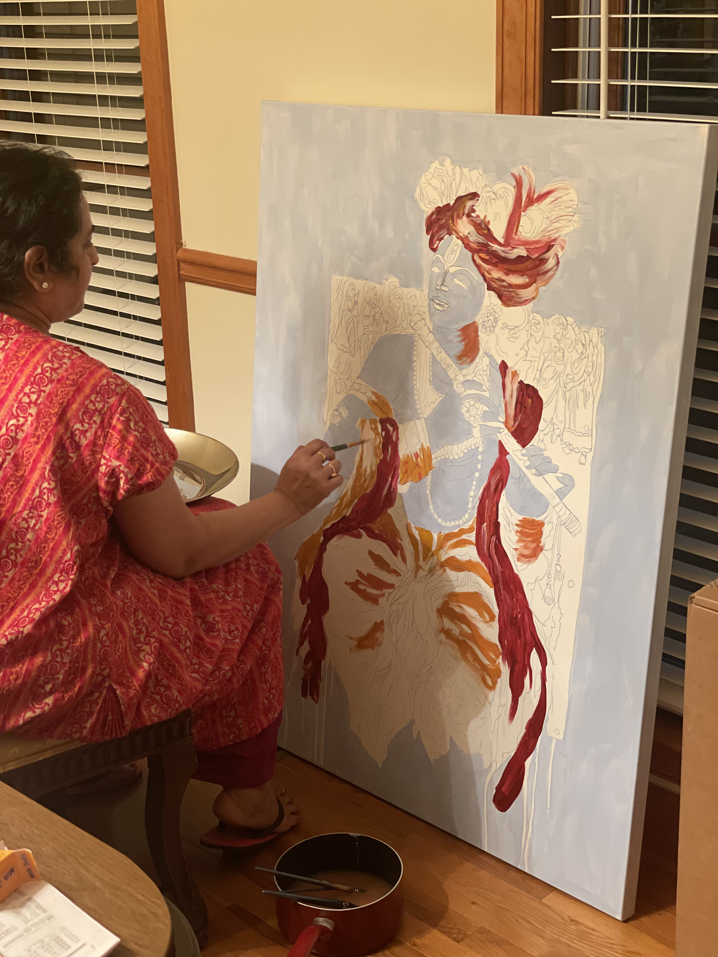 Subha painting in her studio, photograph 1